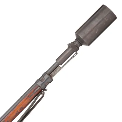 A grenade cup fashioned in metal fixed to the barrel of a Mauser rifle in wood and metal