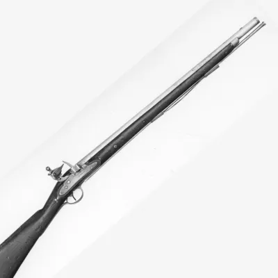 A long smoothbore musket with brass and steel fittings, and a ramrod