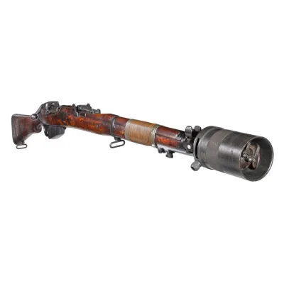 A long rifle in brown wood and blackened steel with a grenade cup attached to the muzzle