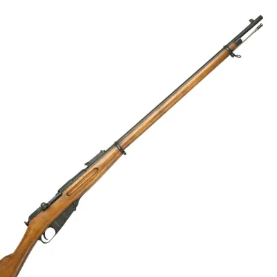 A light coloured wooden rifle with metal barrel, firing mechanism and fittings