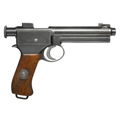 A metallic pistol with a half moon trigger, wooden grip (with circular metal stamp) and cylindrical cocking mechanism
