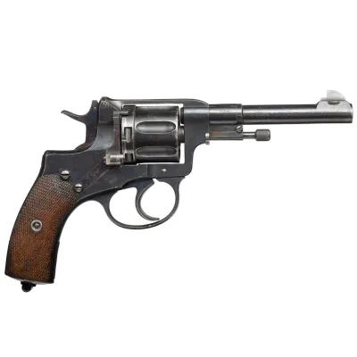 A seven shot revolver in metal with a wooden pistol grip