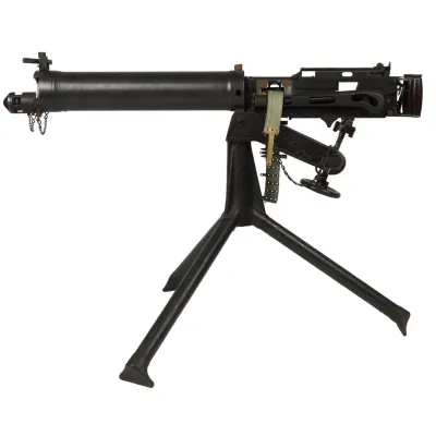 A black machine gun with a smooth, round barrel jacket