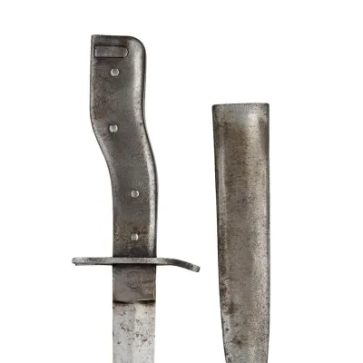 A small steel combination trench dagger and bayonet with scabbard