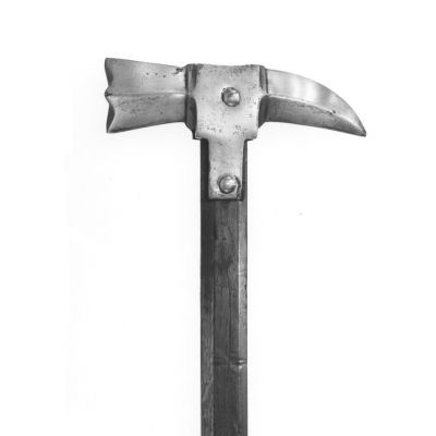 A four sided metal hammer atop a black shaft with a pointed beak on the reverse