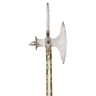 Narrow axe-blade with a rear flat hammer head and a spike on top a decorative pole