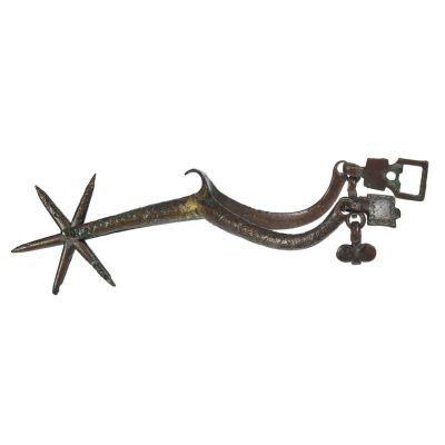 Gilded copper wish-bone shaped bar of metal leading to a spinning, six pronged star at the heel.