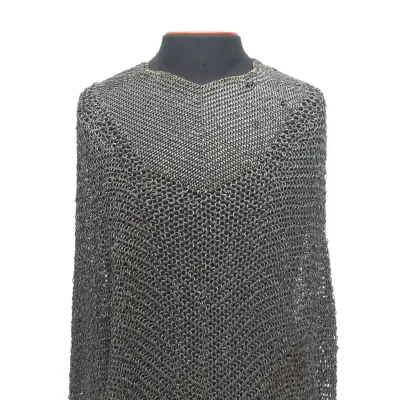 A cape of interlocking iron rings running from the shoulders to the mid-section.