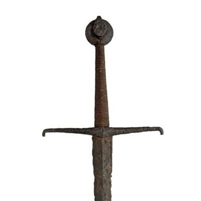 Corroded iron sword with wheel pommel and tapering, downturned cross guard