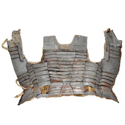 A leather or cloth harness with several bands of plate iron sown or riveted on.
