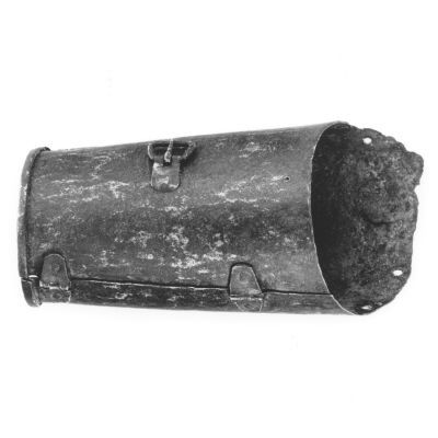 Two plates of iron shaped to fit around the forearm of an adult and connect together on the other side.
