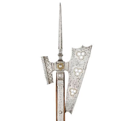 A decorative long axe head in light metal, topped with a square spike and featuring a hammerhead on the reverse.