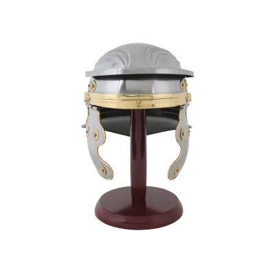 scaled Roman legionnaire’s helmet on a dark wooden stand