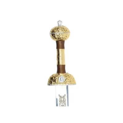Hilt of a sword intricately decorated and engraved in gold and silver