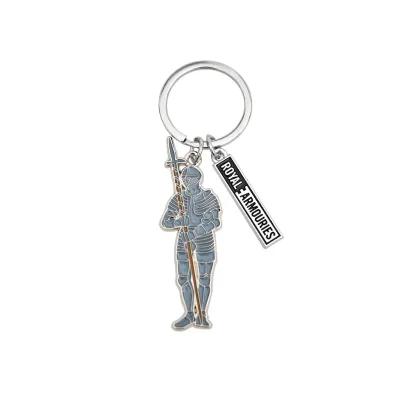keyring with a full suit of armour with a pike attached along with the Royal Armouries logo