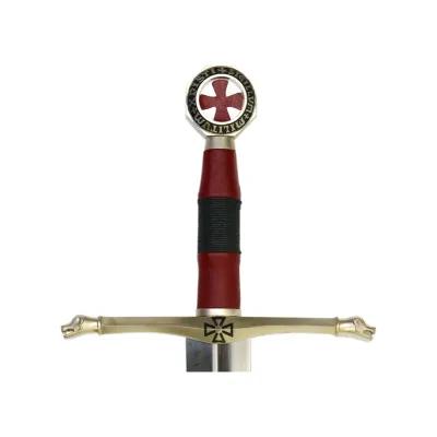 Ornate medieval-style sword hilt featuring a cross motif and intricate metalwork inspired by Knights Templar symbolism