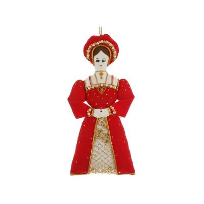 Decorative ornament of a historical figure in a red gown with gold embroidery, pearl accents, and a matching hat, hands clasped at the waist