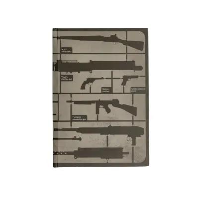 Hardback notebook design displaying black weapon outlines with names including M1917 Enfield, Vickers, Webley, Colt, and Thompson