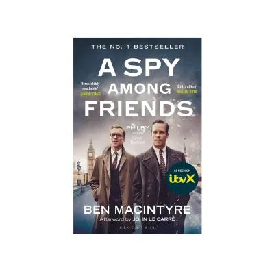 The book cover for A Spy Among Friends shows two suited figures against a foggy London backdrop with Big Ben visible, along with endorsements, the subtitle “Philby and the Great Betrayal,” and an ITVX adaptation badge