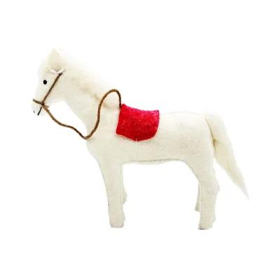 White felt horse ornament with a bright red saddle and brown reins, standing on a plain light background