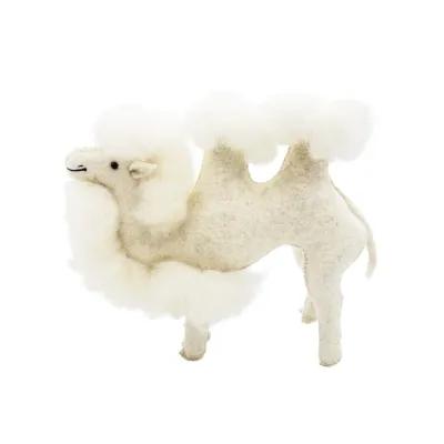 White felt camel figurine with two fluffy humps, black bead eye and stitched facial details on a plain background
