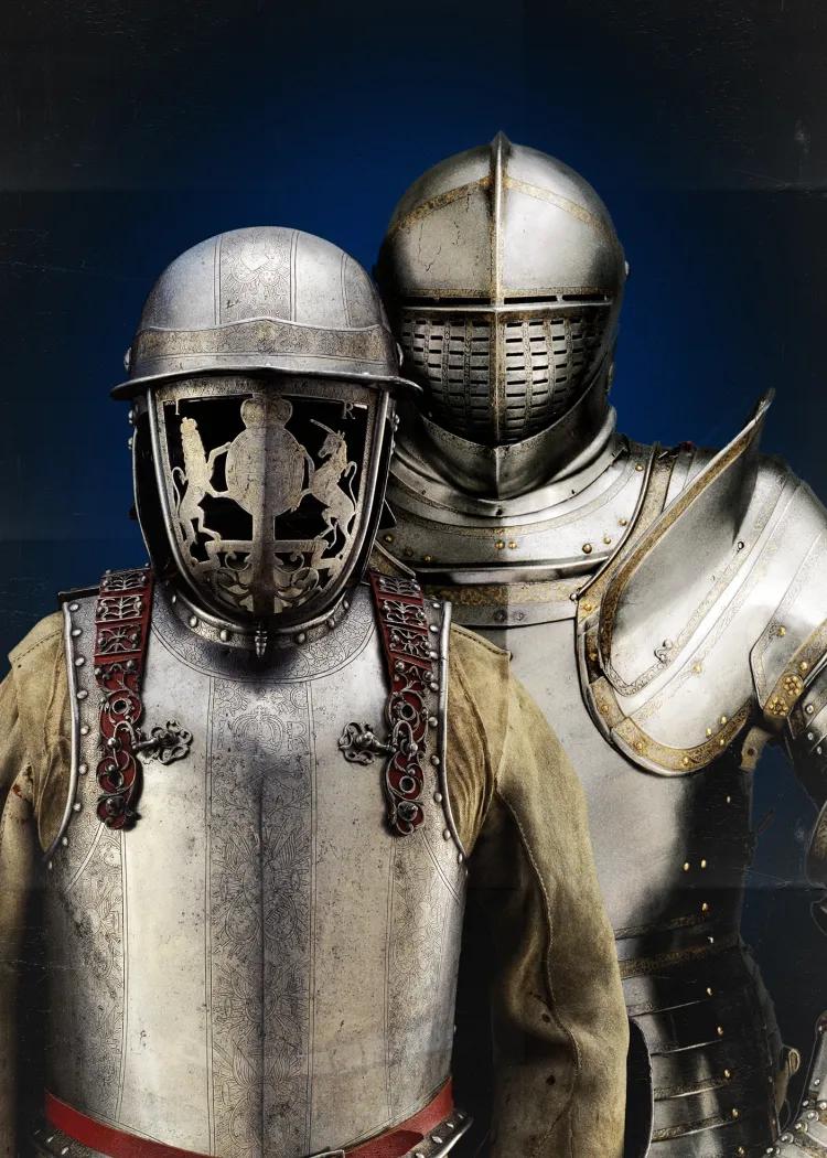 Seventeenth-century harquebusier's armour of James II of England, silvered and decorated with a faceguard bearing the royal arms held by lion and unicorn; armour of Henry VIII stands behind.