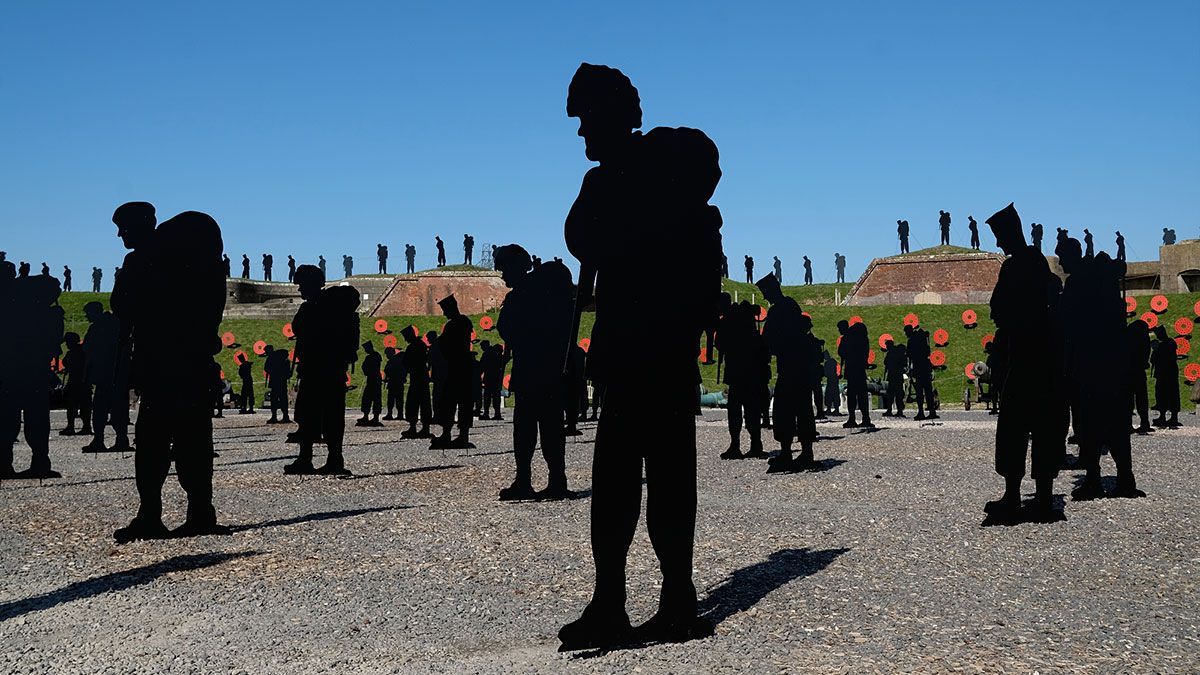 258 silhouettes of military personnel in the courtyard and on the raised banks of Fort Nelson
