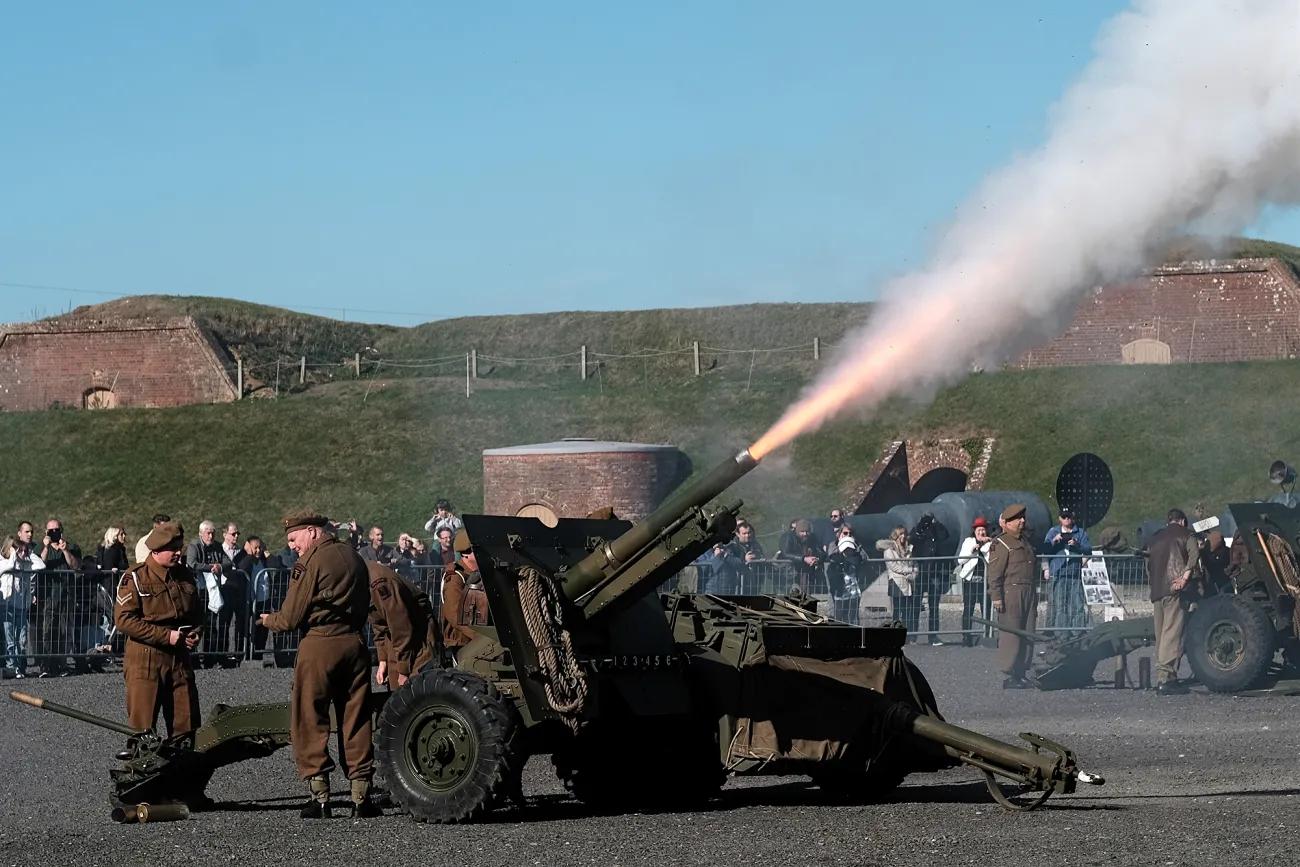 Second world war artillery being fired at fort nelson