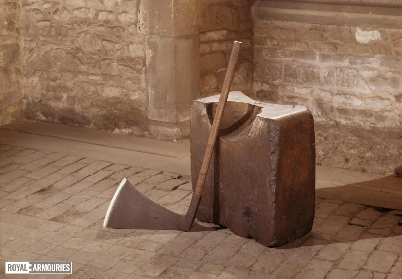 Axe resting against block on cobbled street