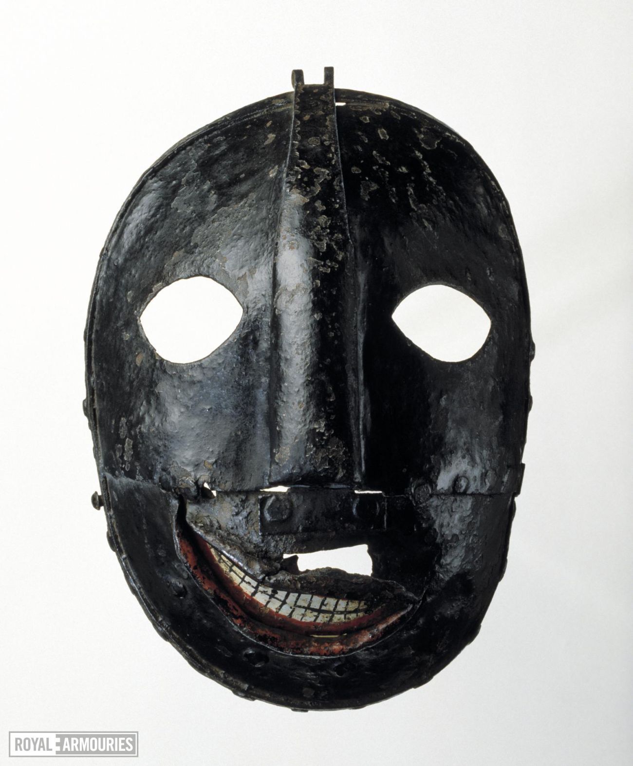 Executioner's mask photographed against white background