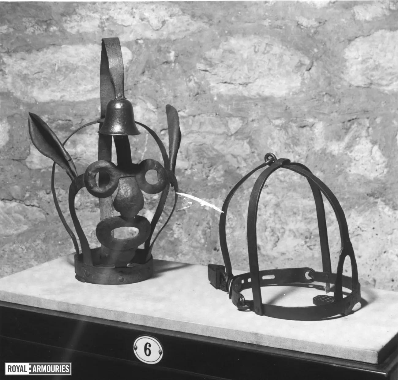 Scold's Bridle sat on table 