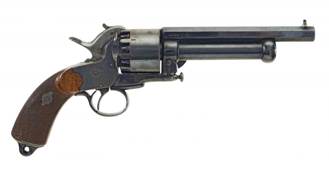 A profile of a revolver made of wood and steel 