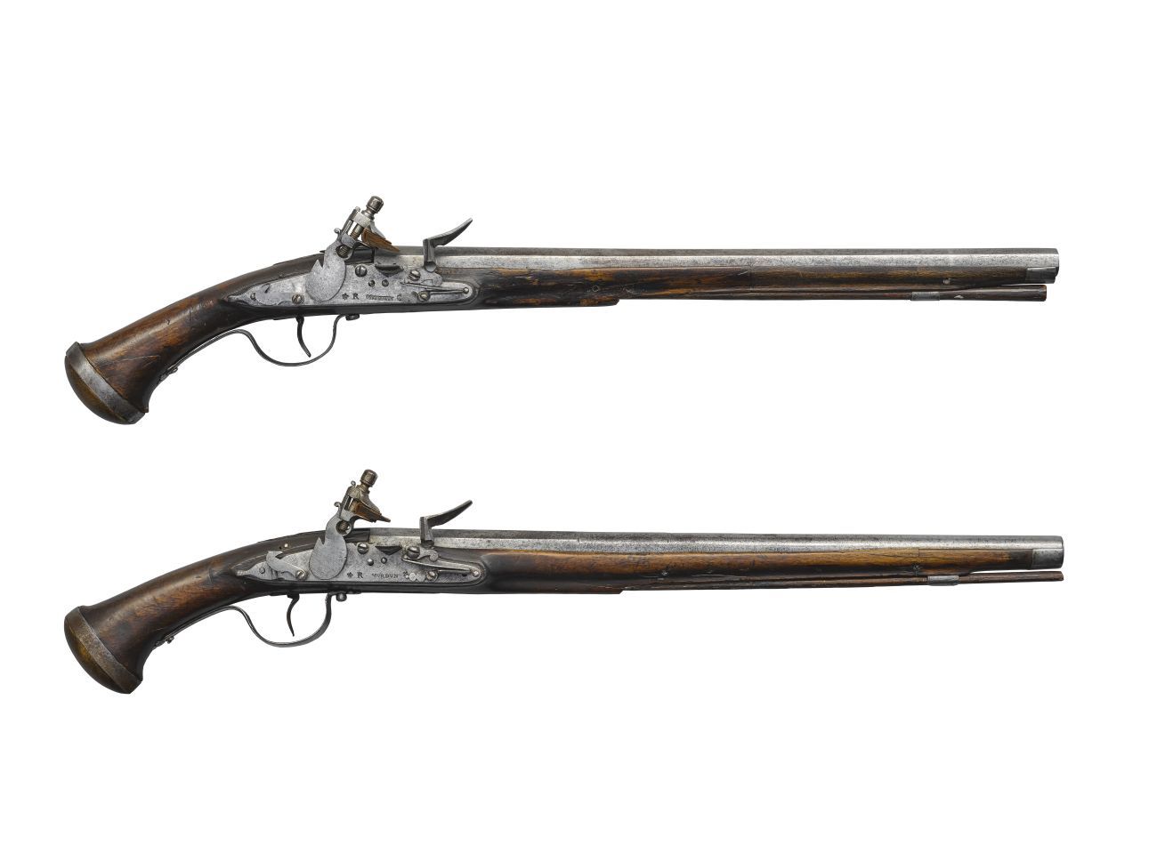 a pair of flintlock pistols