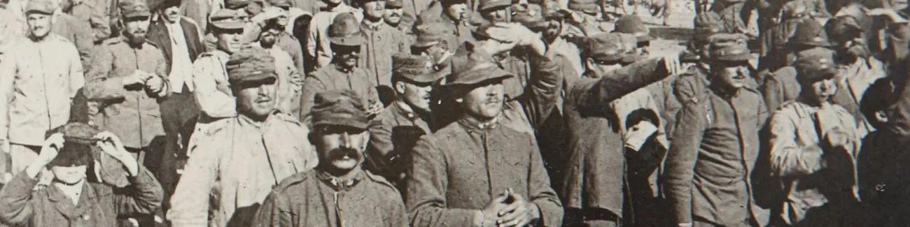 Italian civilians and soldiers gaze up at the sky during the First World War