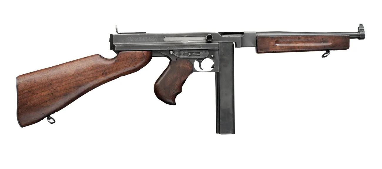 A submachine gun with wooden but and handle