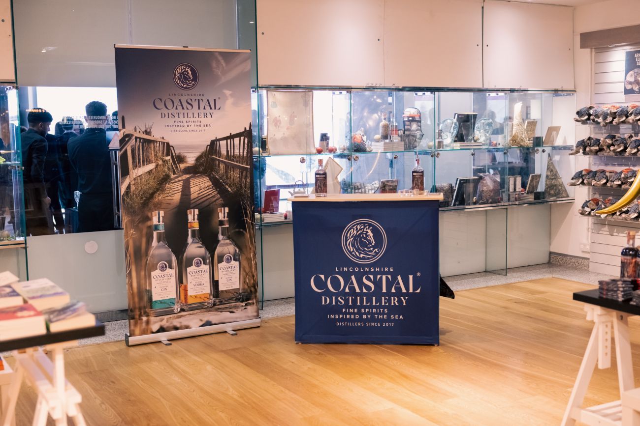 Coastal Gin table and banner in the Royal Armouries museum shop during a product launch