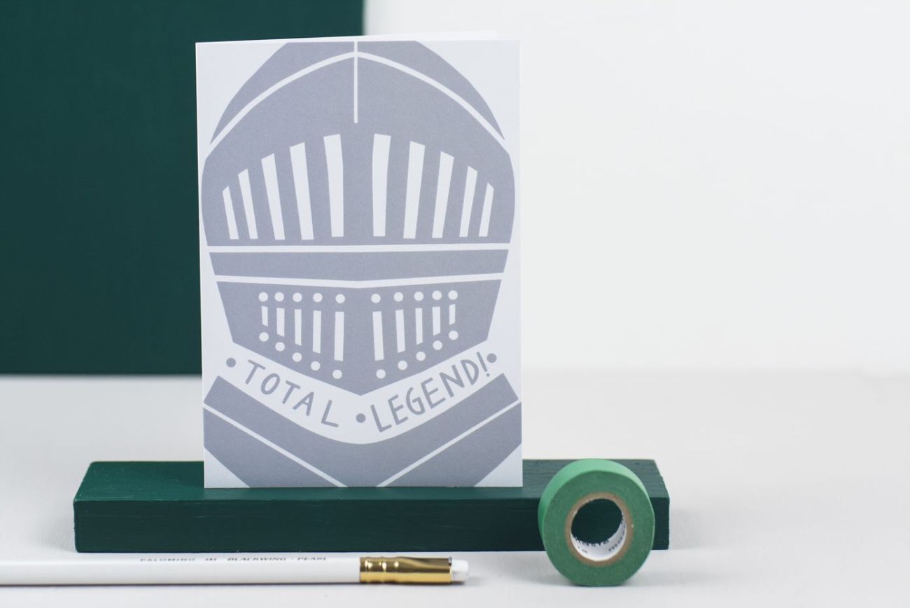 An image of stationary created by Alison Hardcastle. Card reading 'total legend' with an image of a helmet.