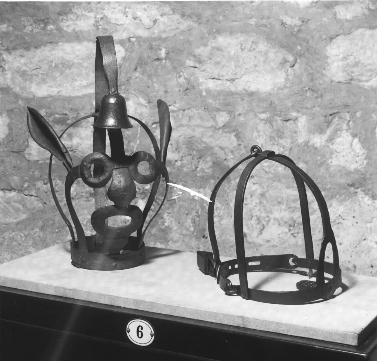 Scold's Bridle sat on table