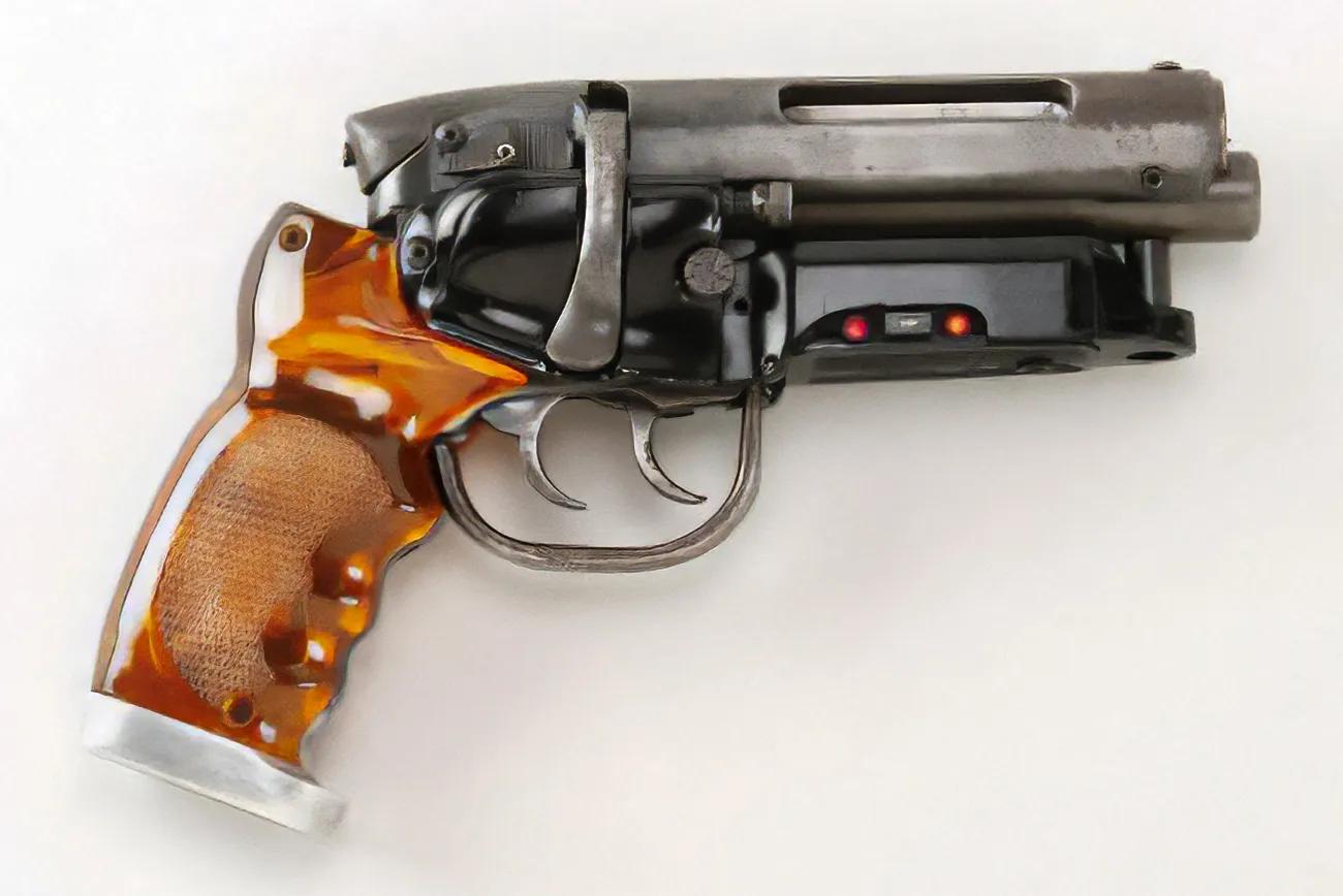 Prop handgun with orange grip featuring two triggers, and LED lights under barrel