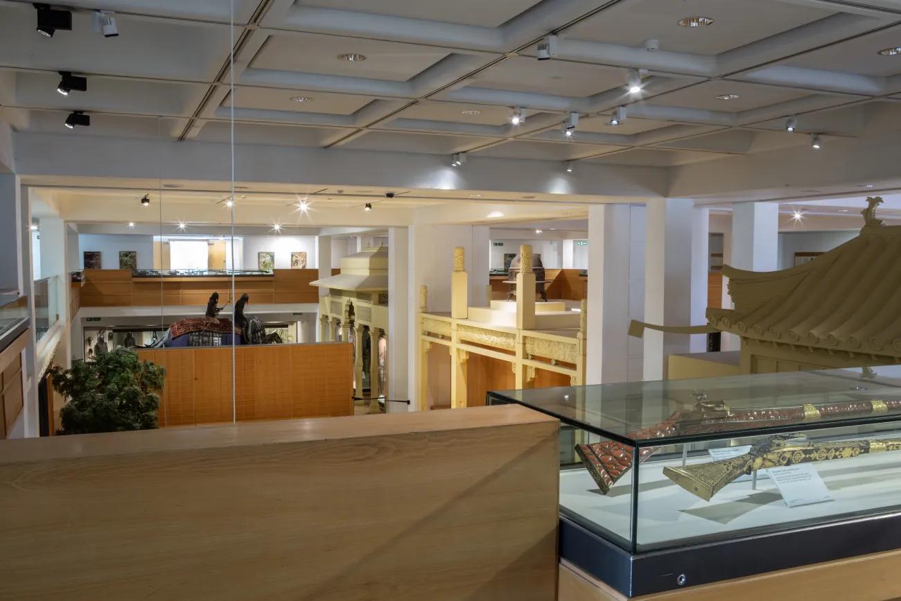 A broad view of a balcony overlooking the Asian and African gallery