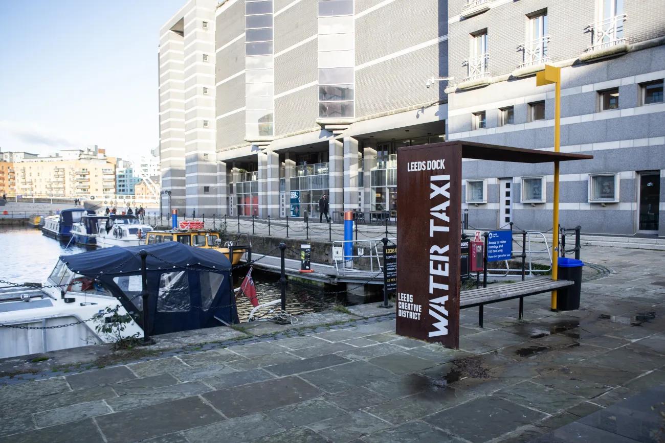 A rust-coloured outside shelter sat next to a dock