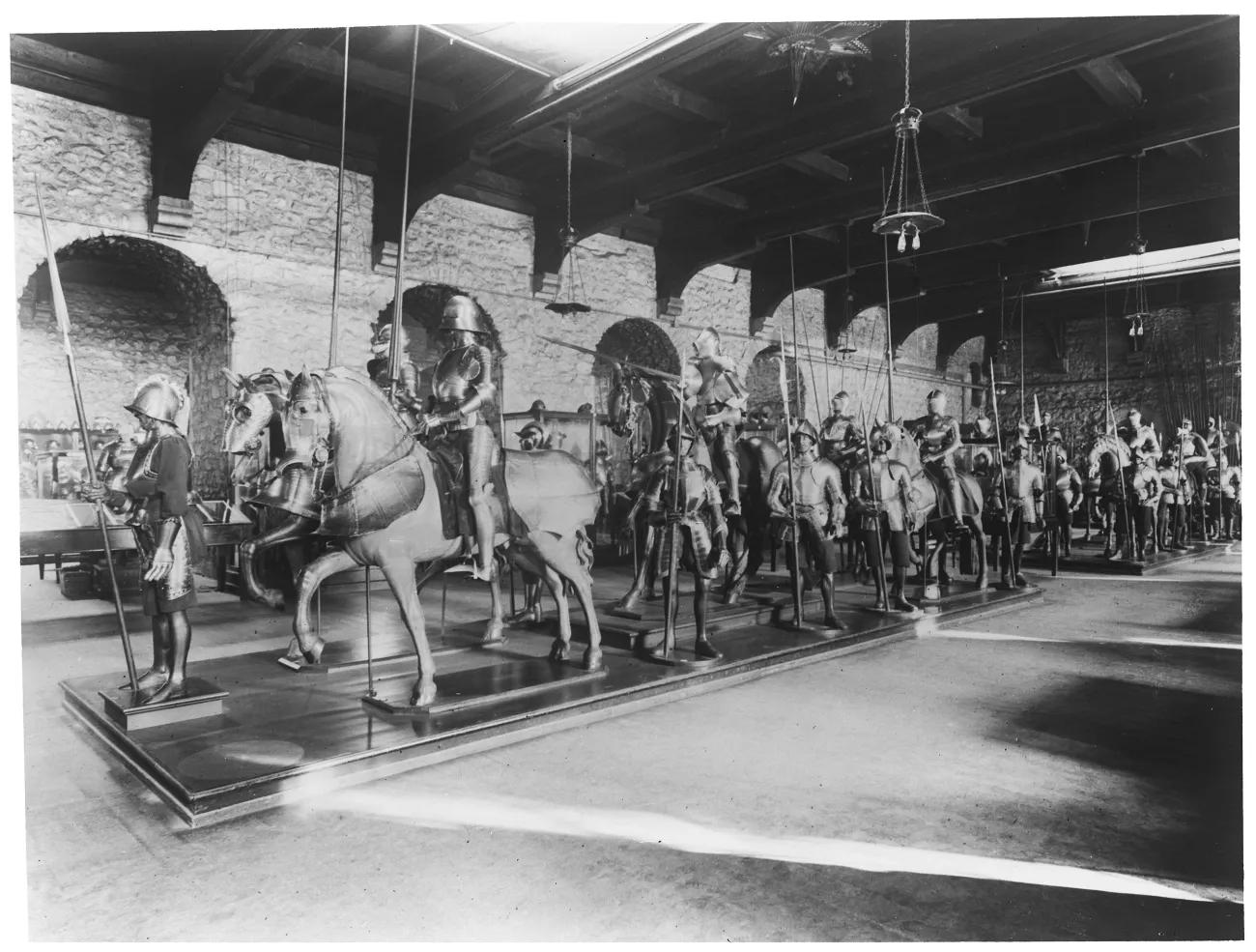 A black and white photograph of the interior of the White Tower with the Line of Kings processing through