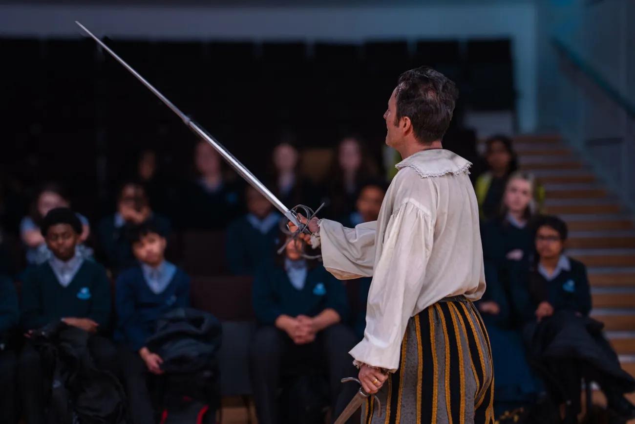 Shakespeare stage combat demonstration with sword for school pupils