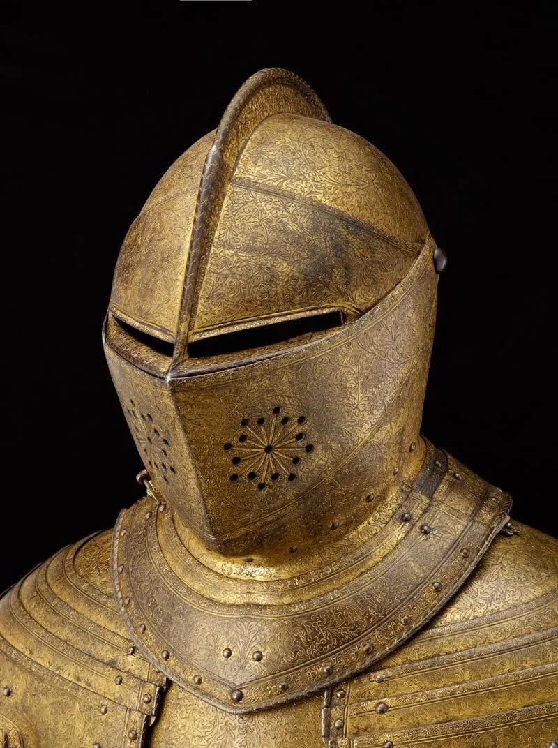 A metal helmet engraved in gold, originally made for Henry, Prince of Wales in the 17th century