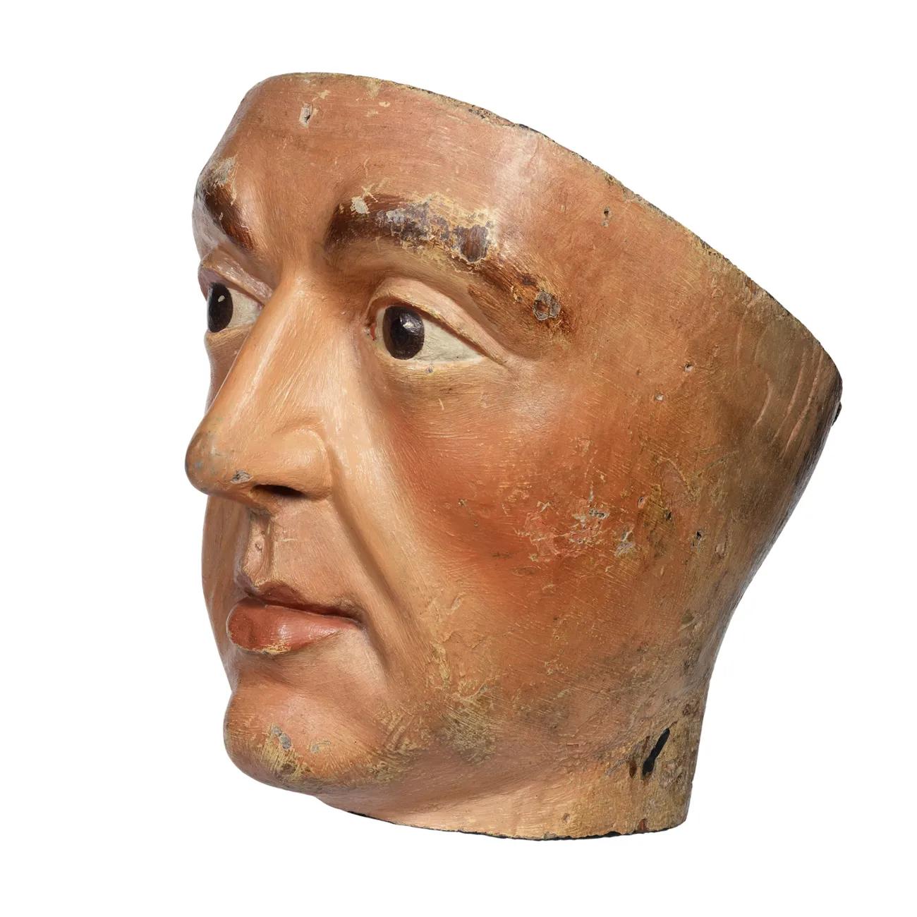 A carved wooden head representing William the Conqueror