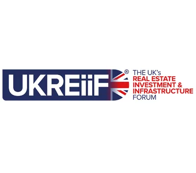 UKREiiF logo with bold blue text and Union flag motif, alongside tagline about UK real estate and infrastructure forum