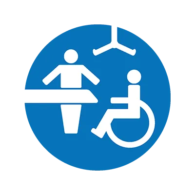Changing Places toilet symbol featuring a blue circle with white icons for a wheelchair user, hoist, and bench