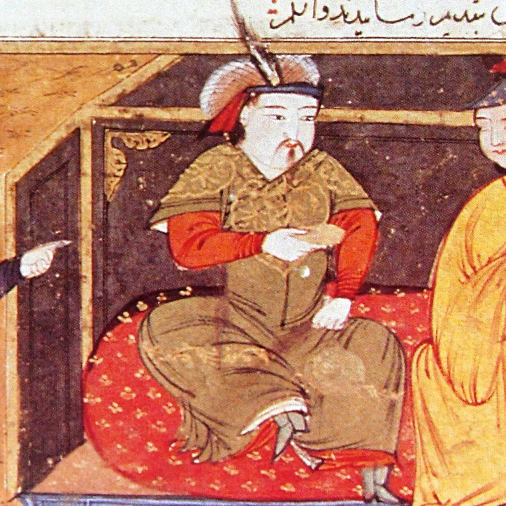 Manuscript painting of a seated court figure on a patterned red cushion beneath decorative script at the top