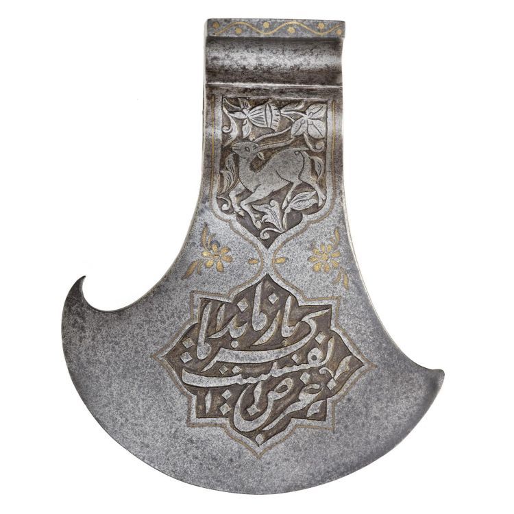 an axe head decorated with a deer below is a cartouche containing Arabic writing
