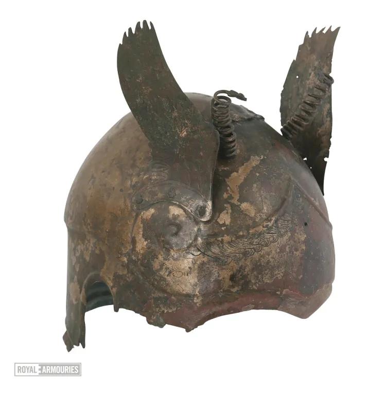 Ancient Greek Bronze helmet with wings coming up from the temples